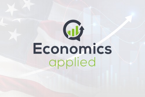 Economics Applied Logo with Economics in black text and Applied in green text with a muted American Flag in the background