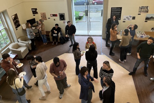 Photo of students and faculty gathered in Mencoff Hall Lobby