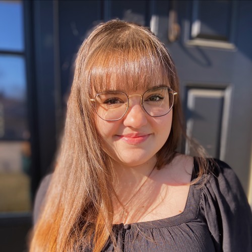 Macy Brammer smiling in natural lighting.