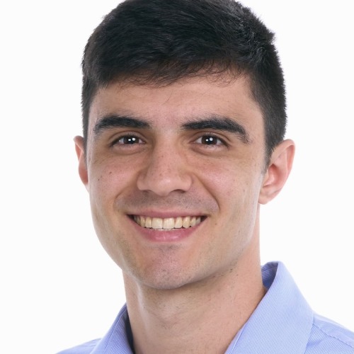 Benjamin Delgado wearing blue polo shirt on white background